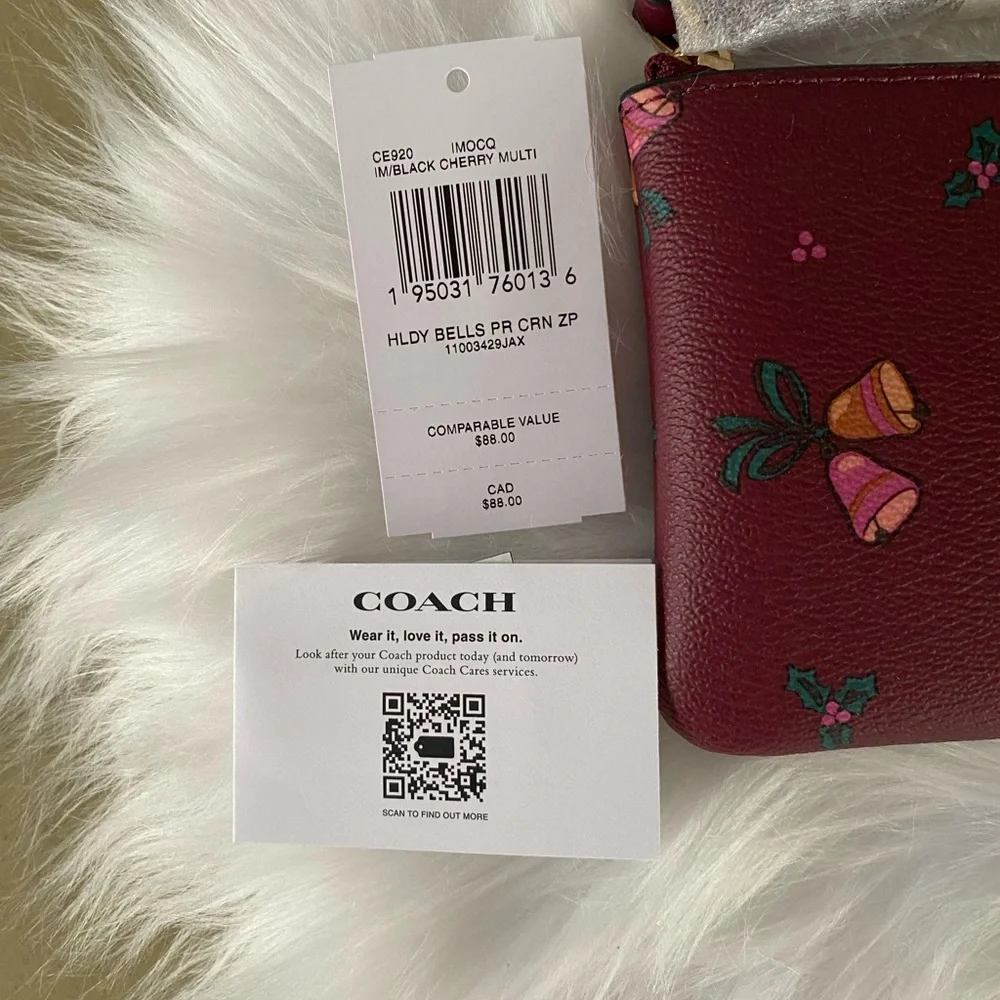 Coach NWT corner zip wristlet with holiday bells print